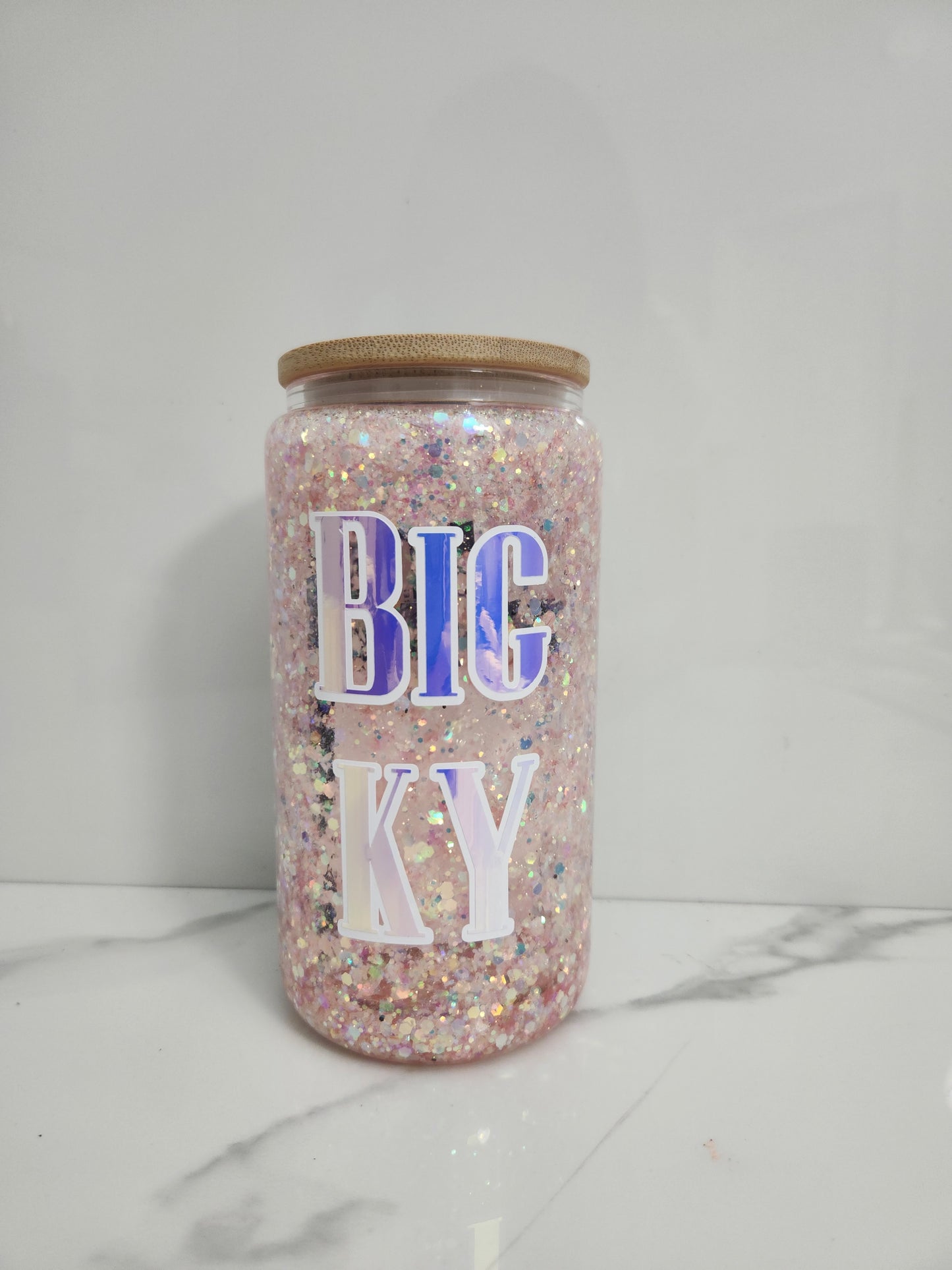 Glitter glass snow globe